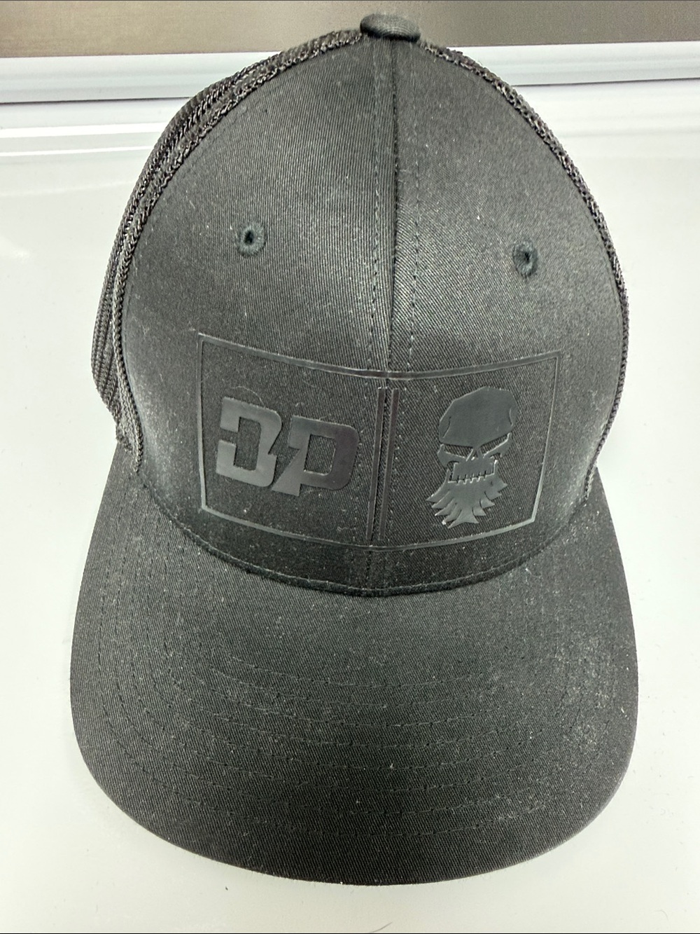 Port Authority Black Trucker Hat with DP Skull